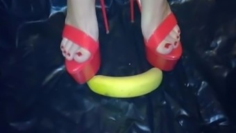 Hot Red High Heels Crush A Banana