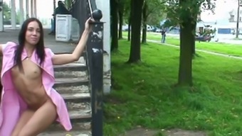 Fine And Sultry Lean Brunette Teen In Pink Dress Shows Her Goodies At The Train Station