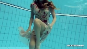 Lucy Takes The Dress Off Showing Her Hairy Pussy And Titties Underwater