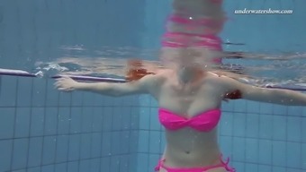 Lovely Lera Takes Her Pink Swimsuit In A Swimming Pool
