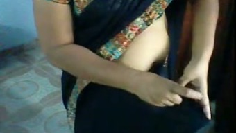 My Chubby Indian Spouse Puts Her Sari On In Homemade Clip