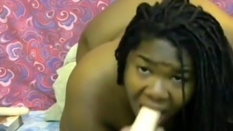 Big Ebony Woman Suck Deep A White Toy And Slap Her Face