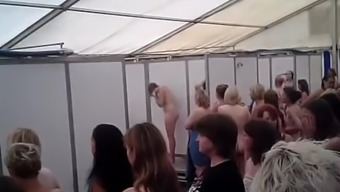 A Crowd Of Women In Public Shower