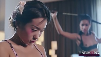 Two Lesbians Make Use Of Ball Gag And Strapon To Punish Chinese Babe Alina Li