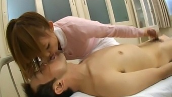 Kinky Asian Nurse Yuu Konishi Takes A Large Dick In Her Hands