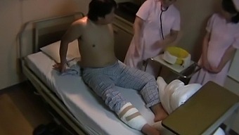 Dirty Japanese Nurse Gives A Blowjob And Enjoys Having 69 On The Bed