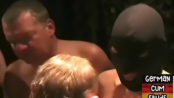 Close-Up Action Of Masked Gay Getting Anal And Mouth Fucked In Slingshot Orgy