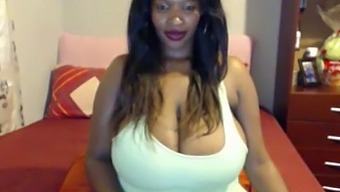 Big-Titted Black Beauty Flaunts Her Curvy Figure