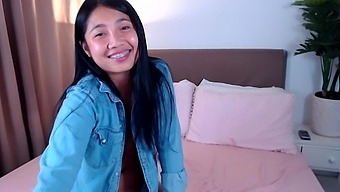 Asian Brunette'S Solo Play With Toys On Webcam