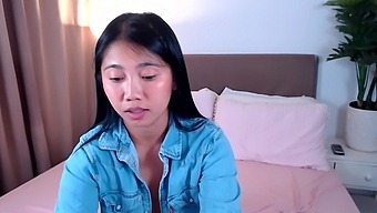 Asian Brunette'S Solo Play With Toys On Webcam