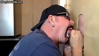 A Deep-Throat Gay Enjoys Sucking A Nice Cock While Stroking It At A Gloryhole
