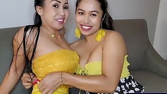 Two Thai Lesbians With Big Breasts Enjoy Each Other'S Company