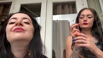 Latex-Clad Mistress Lara And Dominatrix Nika Indulge In Smoking And Vaping Fetish