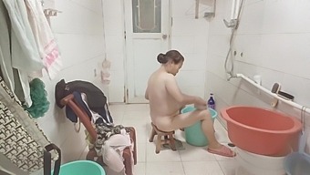 Mature Brunette Indulges In A Self-Photography Bath